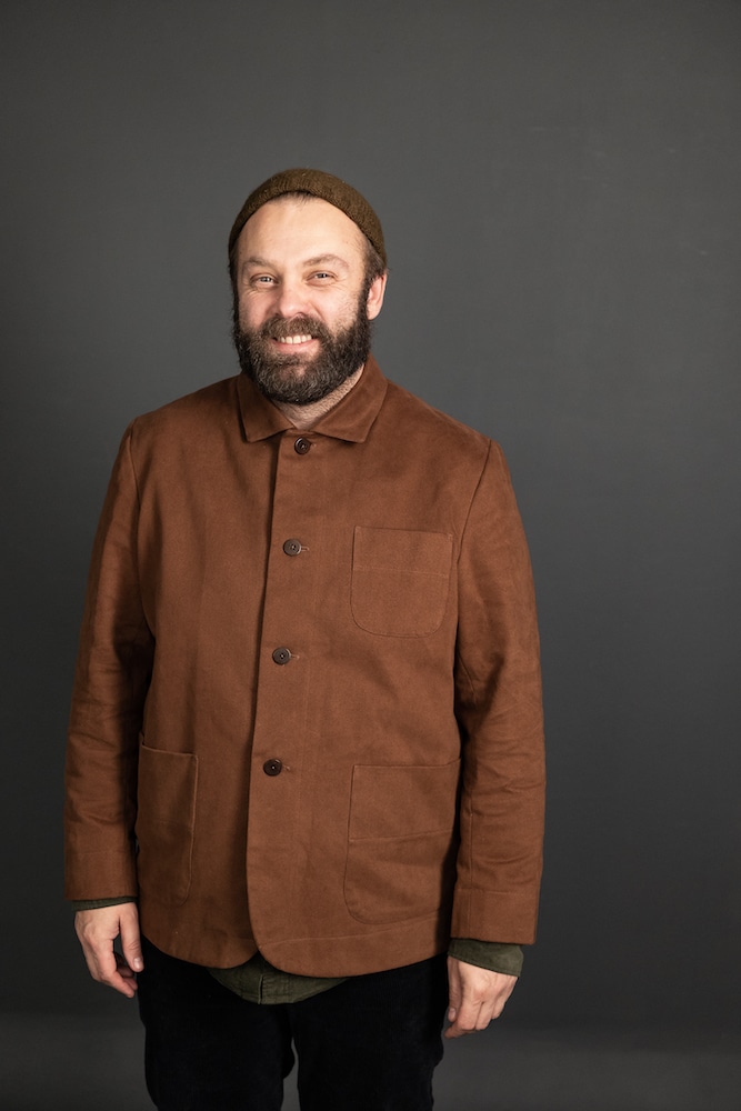 Fashion Model Wearing Merchant and Mills Sewing Pattern for The Foreman Jacket - Mens - Experienced 36 - 46