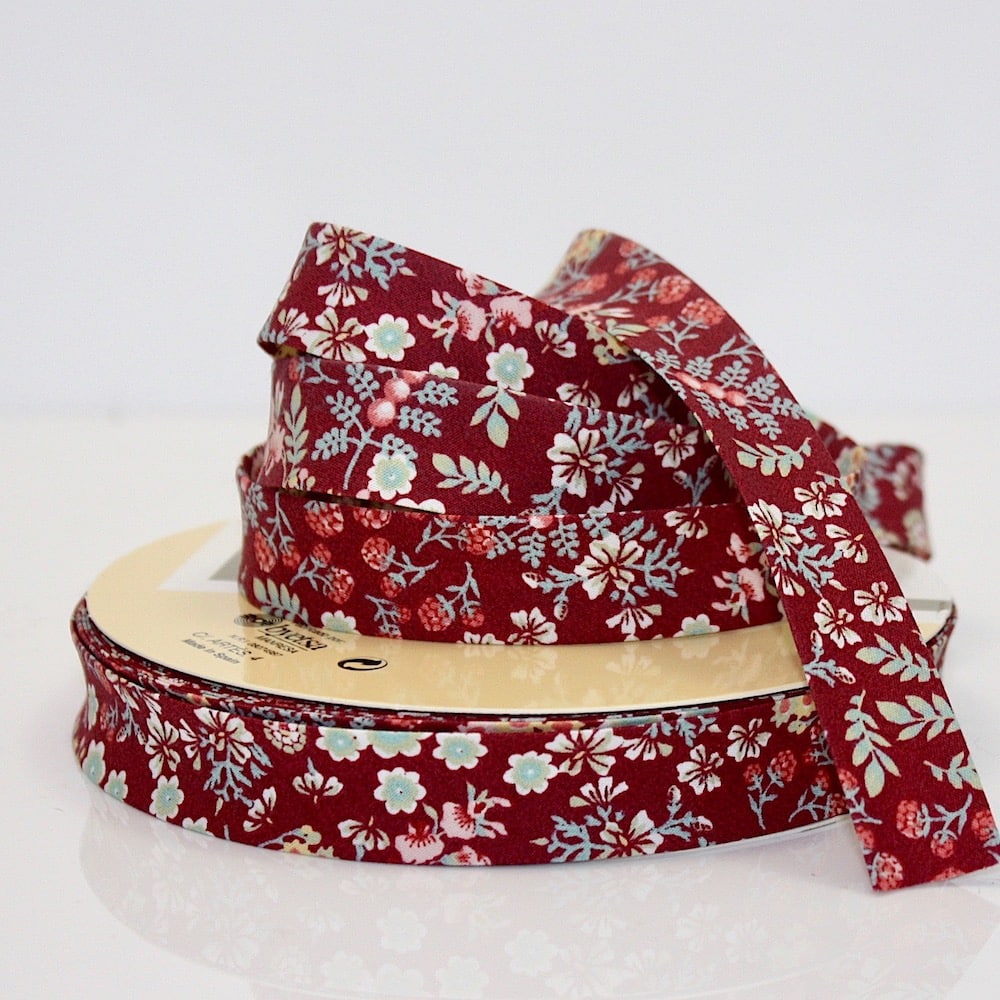 25m roll of Organic Desire Floral Byetsa Fany Bias Binding Tape with 18mm width in 49 Deep Red