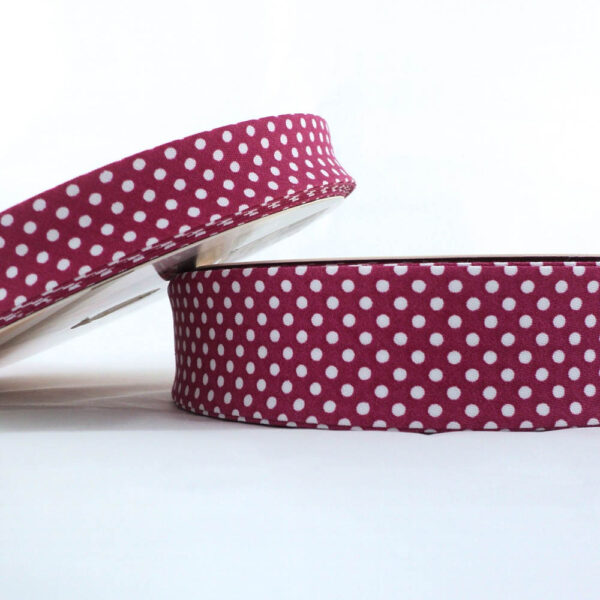 25m roll of Dot Bias Binding Tape with 18mm width in Magenta 49