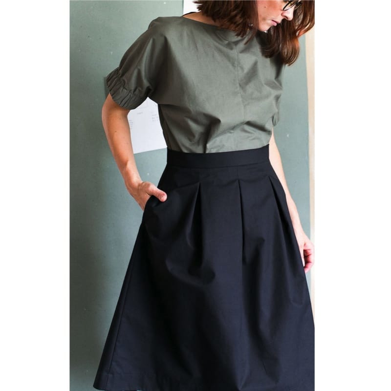Fashion Model Wearing Assembly Line Sewing Pattern for Three Pleat Skirt - Average XL - XXXL