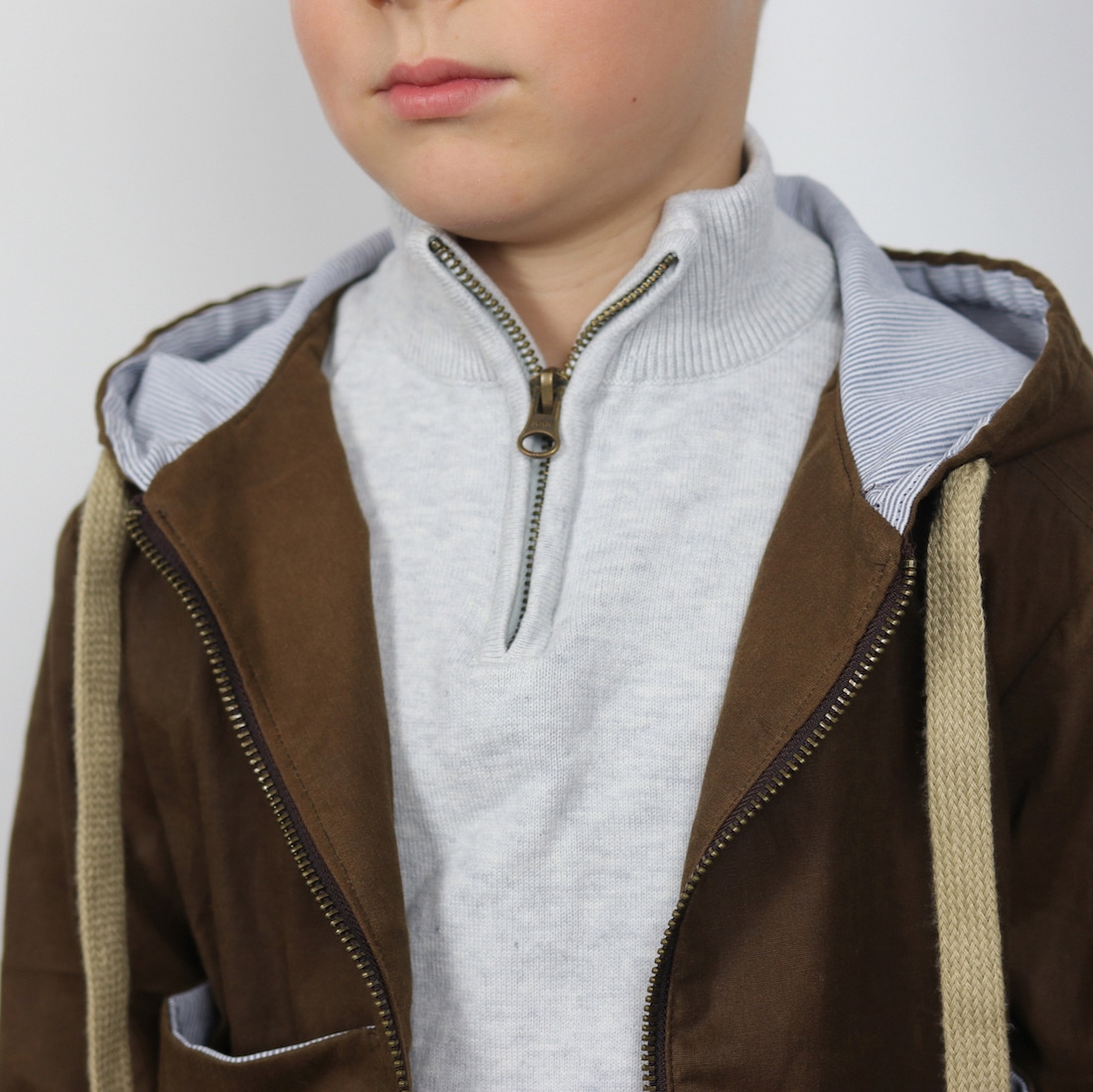 Fashion Model Wearing Ikatee Couture Sewing Pattern for Sam KIDS Coat Jacket