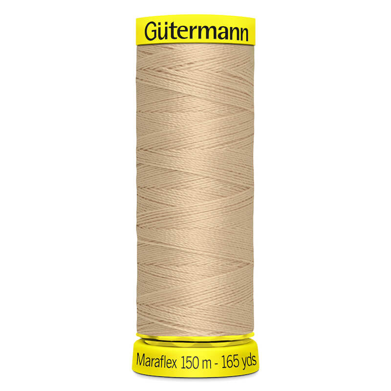 150 metre spool of Gutermann Maraflex Elastic Stretch Sewing Thread in 186 Fawn