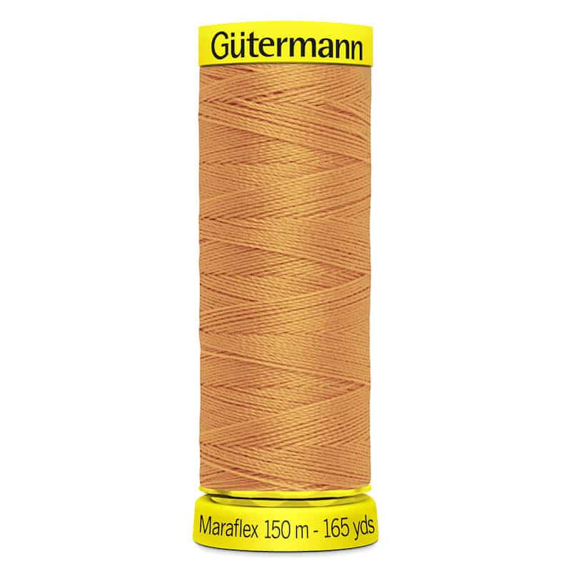 150 metre spool of Gutermann Maraflex Elastic Stretch Sewing Thread in 300 Apricot