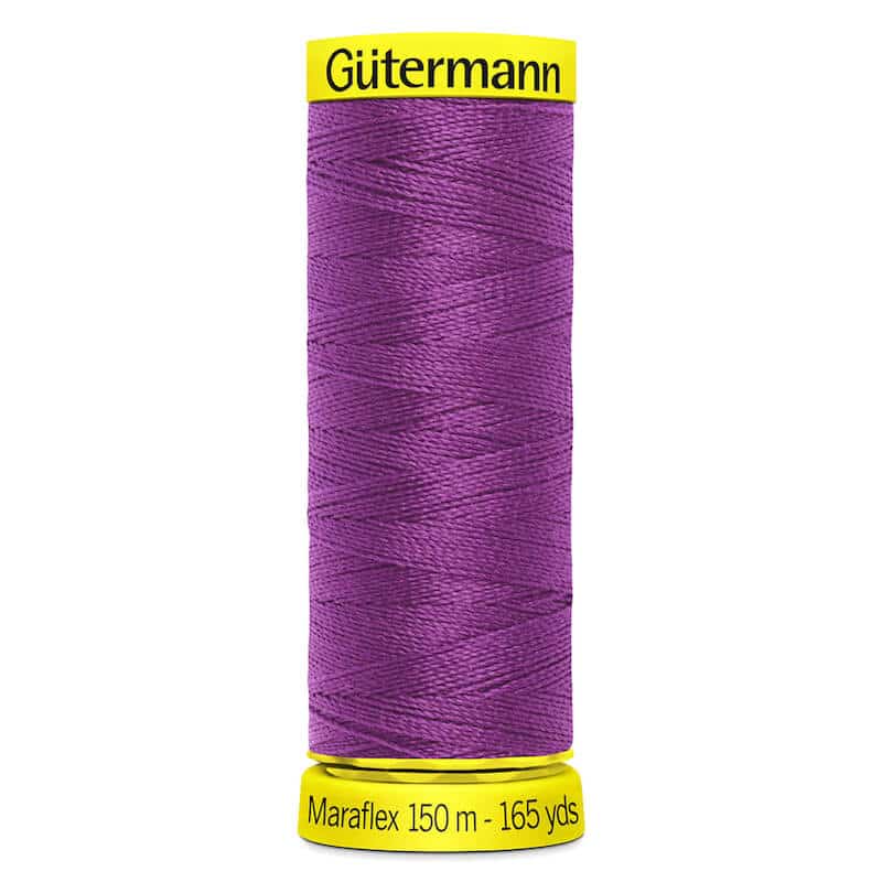 150 metre spool of Gutermann Maraflex Elastic Stretch Sewing Thread in 321 Dark Cerise
