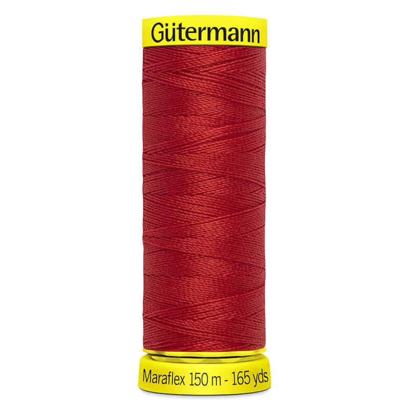 150 metre spool of Gutermann Maraflex Elastic Stretch Sewing Thread in 364 Brick Red