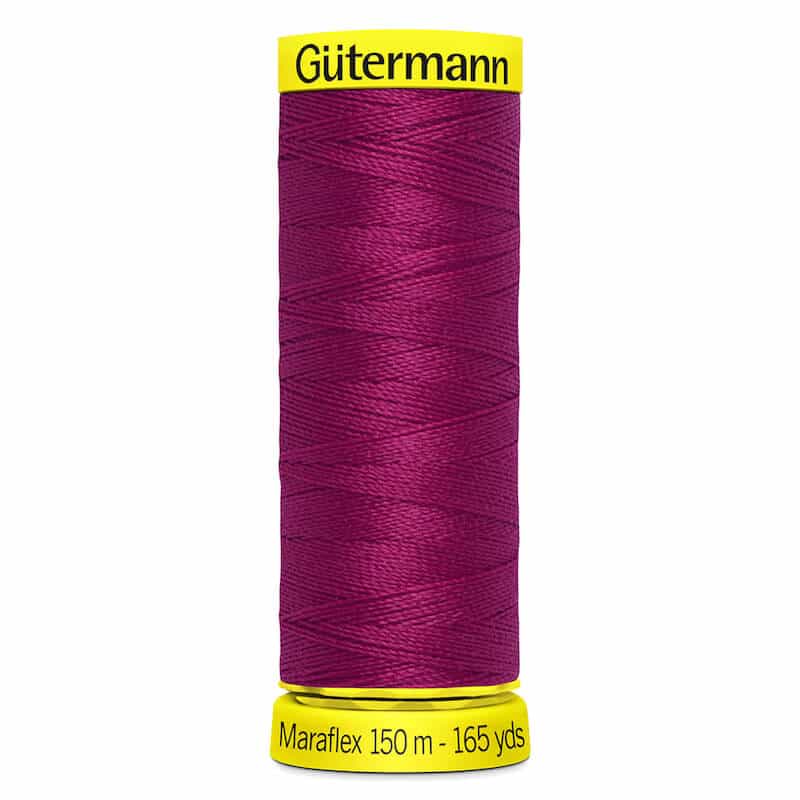 150 metre spool of Gutermann Maraflex Elastic Stretch Sewing Thread in 384 Crimson