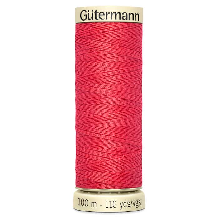 100 metre spool of Gutermann Sew-all Sewing Thread in 016 Coral Red