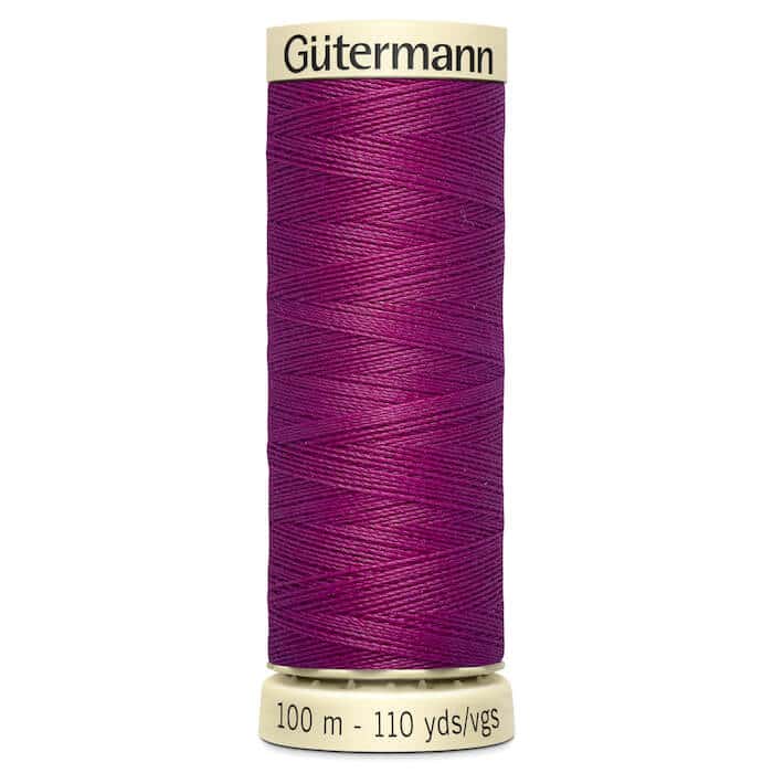 100 metre spool of Gutermann Sew-all Sewing Thread in 247 Magenta