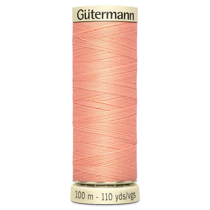 100 metre spool of Gutermann Sew-all Sewing Thread in 586 Sweet Peach