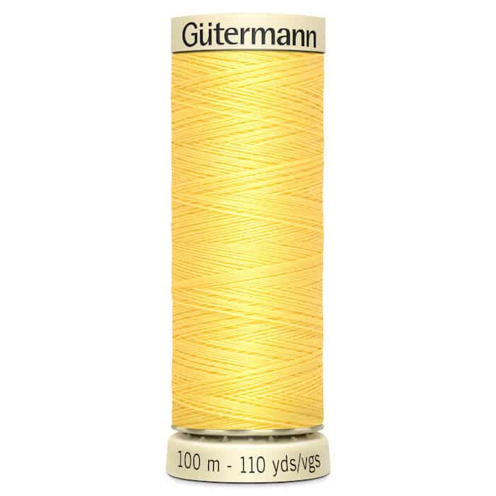 100 metre spool of Gutermann Sew-all Sewing Thread in 852 Primrose/Baby Yellow