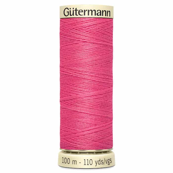 100 metre spool of Gutermann Sew-all Sewing Thread in 986 Flamingo Pink