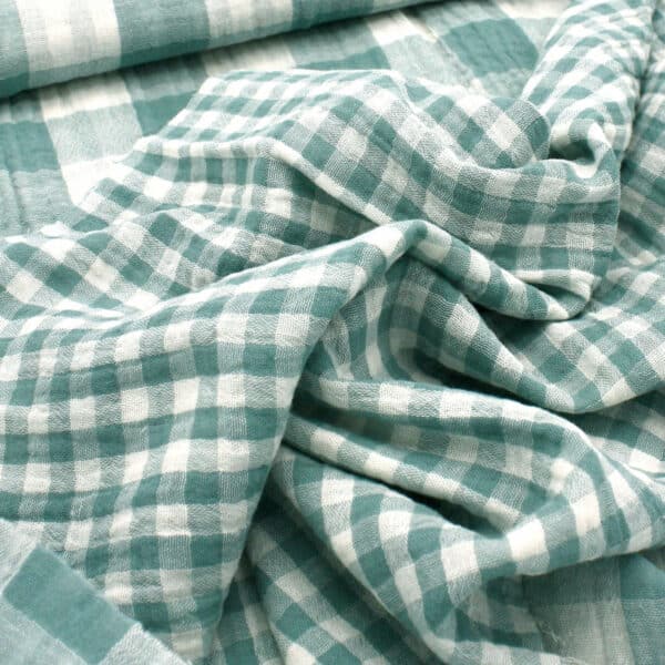 close up of green gingham fabric