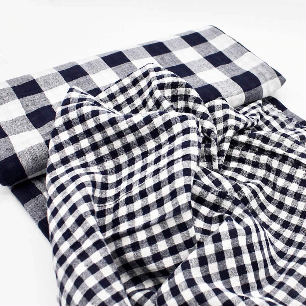 fabric bolt showing double size check gingham in a double gauze fabric in black