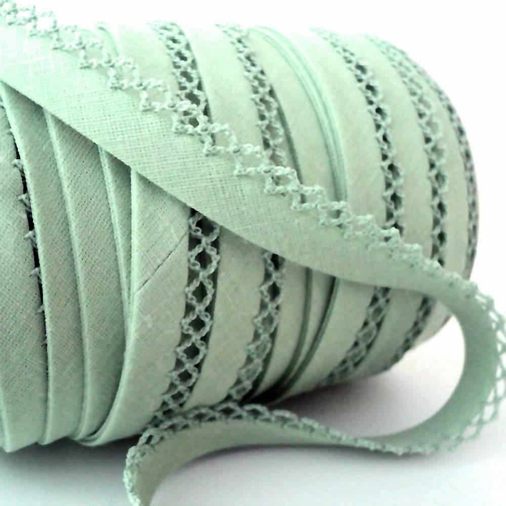 roll of pale green picot lace edge bias binding