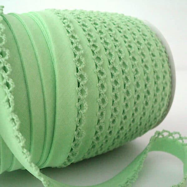 roll of pale lime picot lace edge bias binding