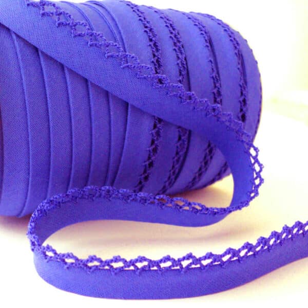 roll of blue purple picot lace bias binding