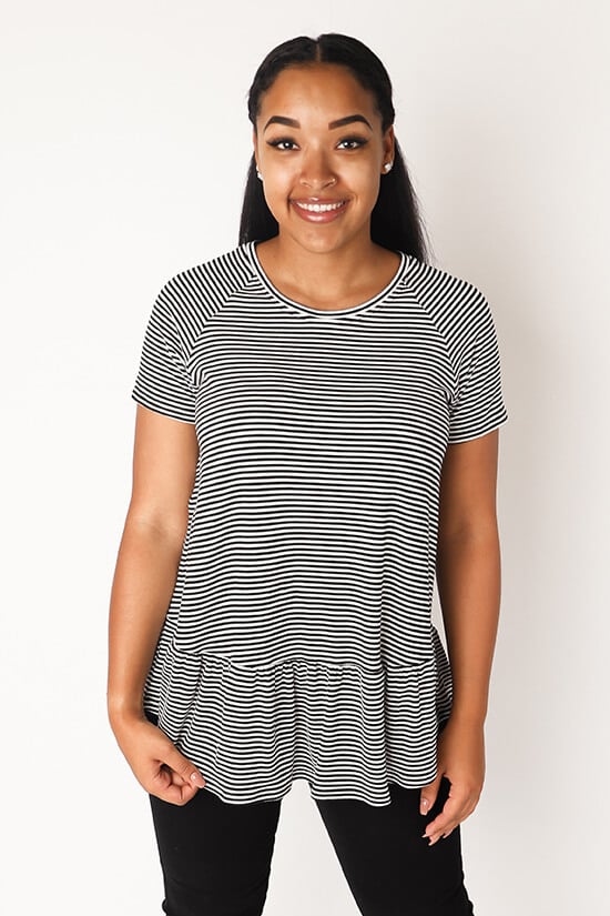 yound woman wearing a short sleeved striped top on a dressmaking pattern front