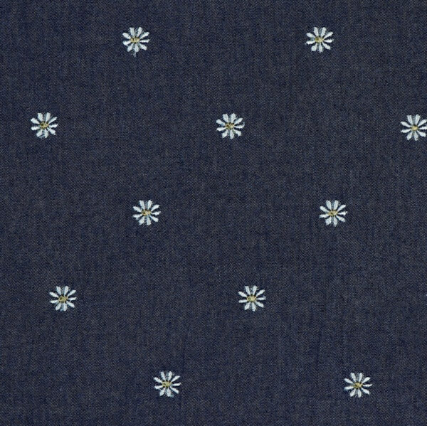 embroidered cotton denim in indigo blue with white daisy
