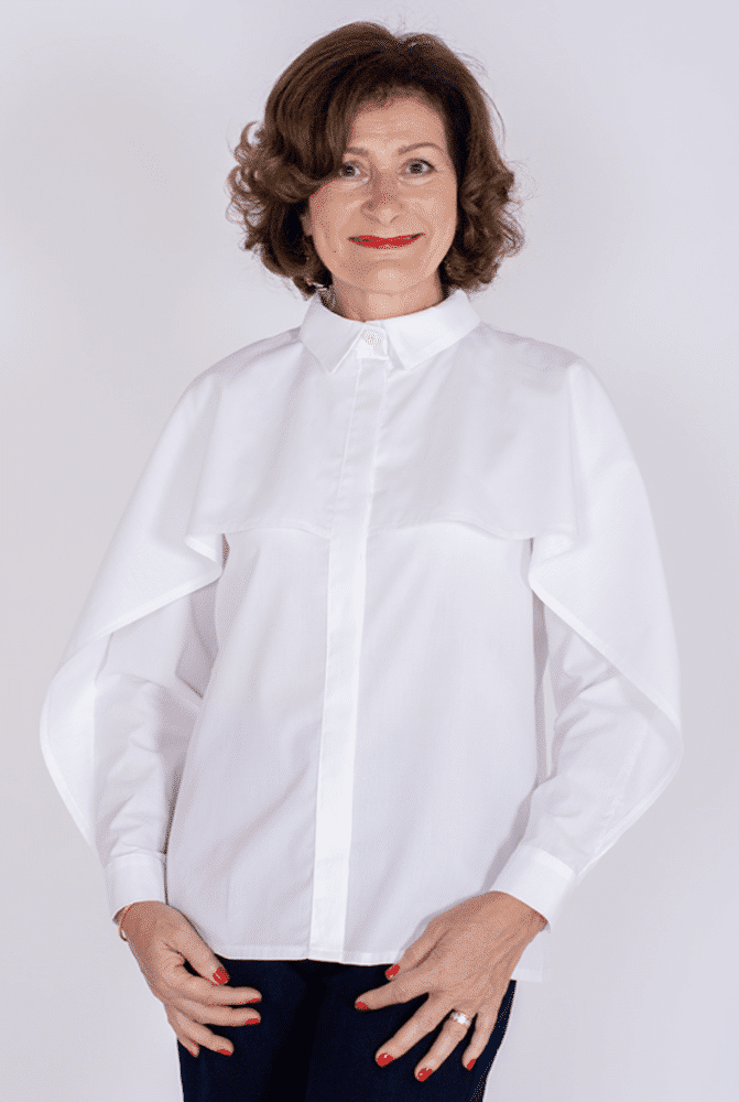 lady wearing a white cotton blouse or shirt with long sleves