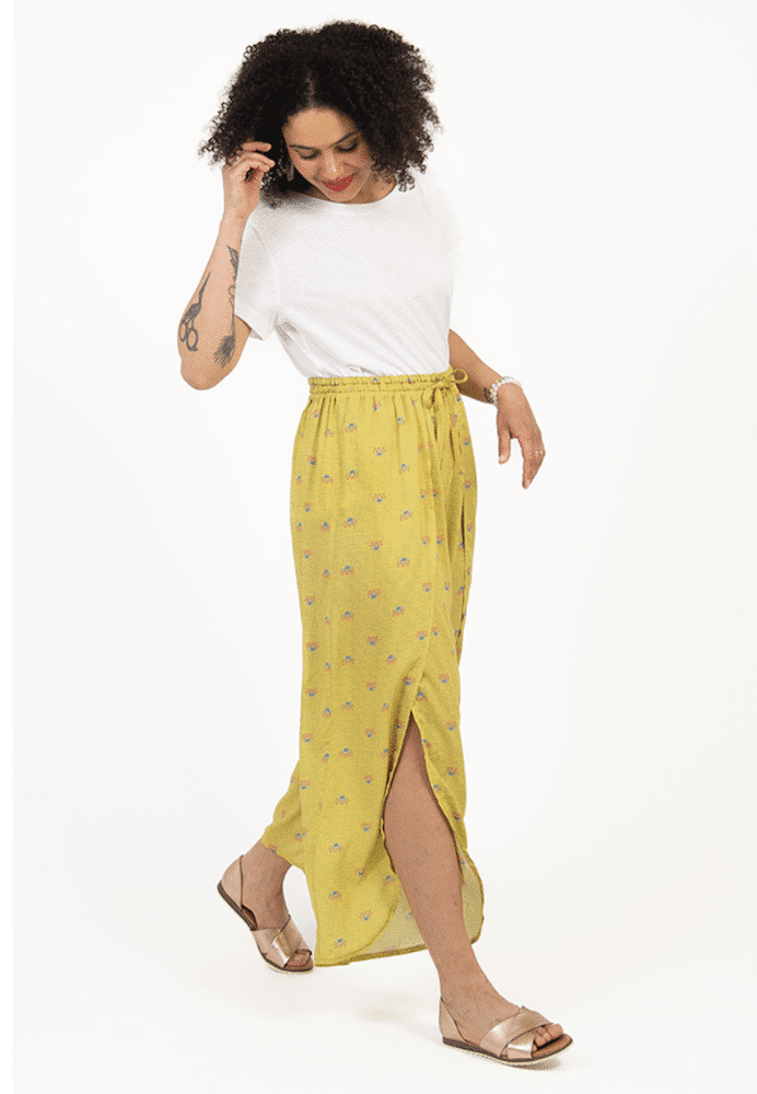lady wearing yellow loose fit pants with split hem in yellow