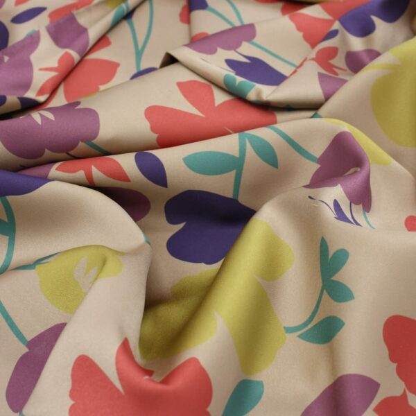 softly folded floral printed satin fabric in camel