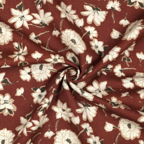 close up of a big floral linen print fabric in brown red