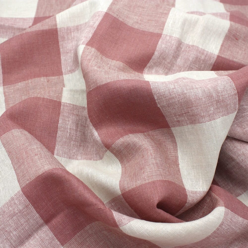 close up of large gingham fabric in linen and viscose dusty pink