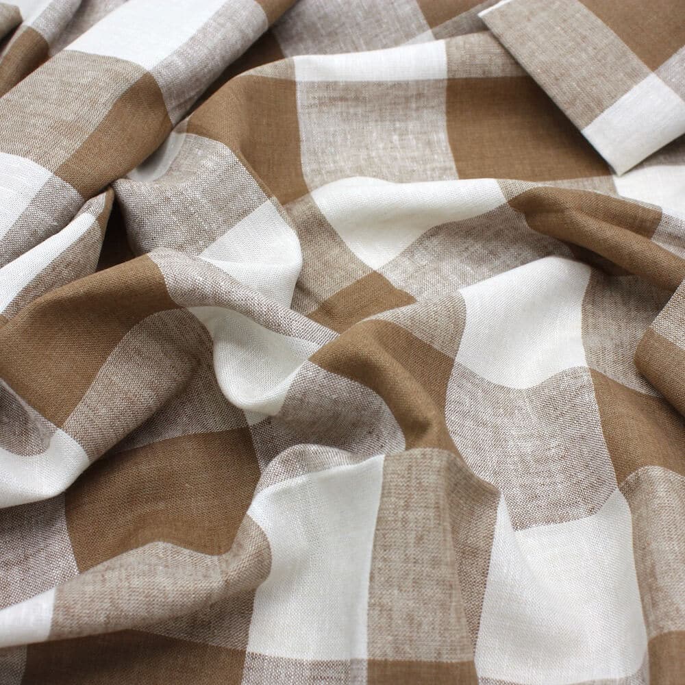 close up of large gingham fabric in linen and viscose dusty brown