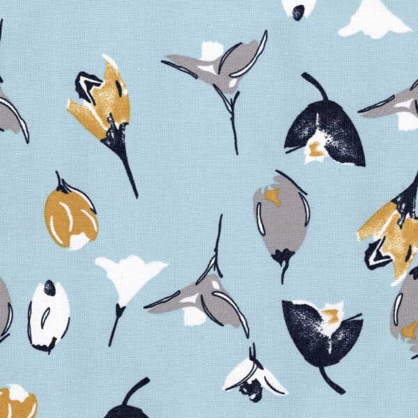 linen and cotton tulip print fabric close up blue