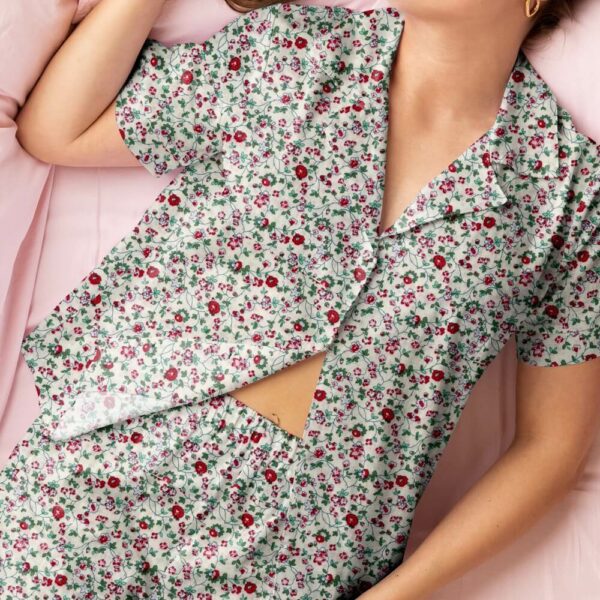 lady on a bed wearing pyjamas in cotton poplin floral