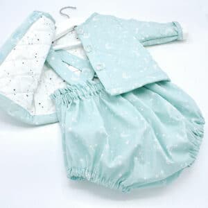 quilted baby jacket in pale blue with matching rompers