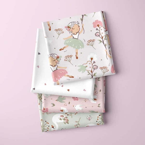 angele bundle of fabrics on pink backgroud