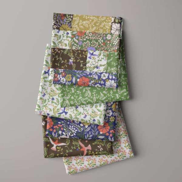 All designs in a bundle of Blosy floral fabrics on grey background