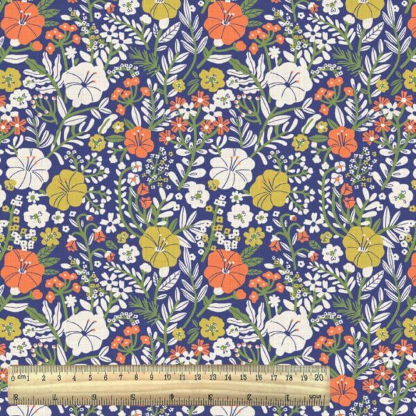 Allover blue floral print from the Blosy fabric collection with ruler