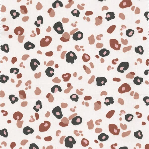 Irregular leopard spots on cream jersey from the Felyna collection of cotton prints