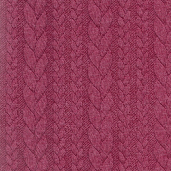 Close up - Raspberry pink cable knit jersey fabric Higgs and Higgs