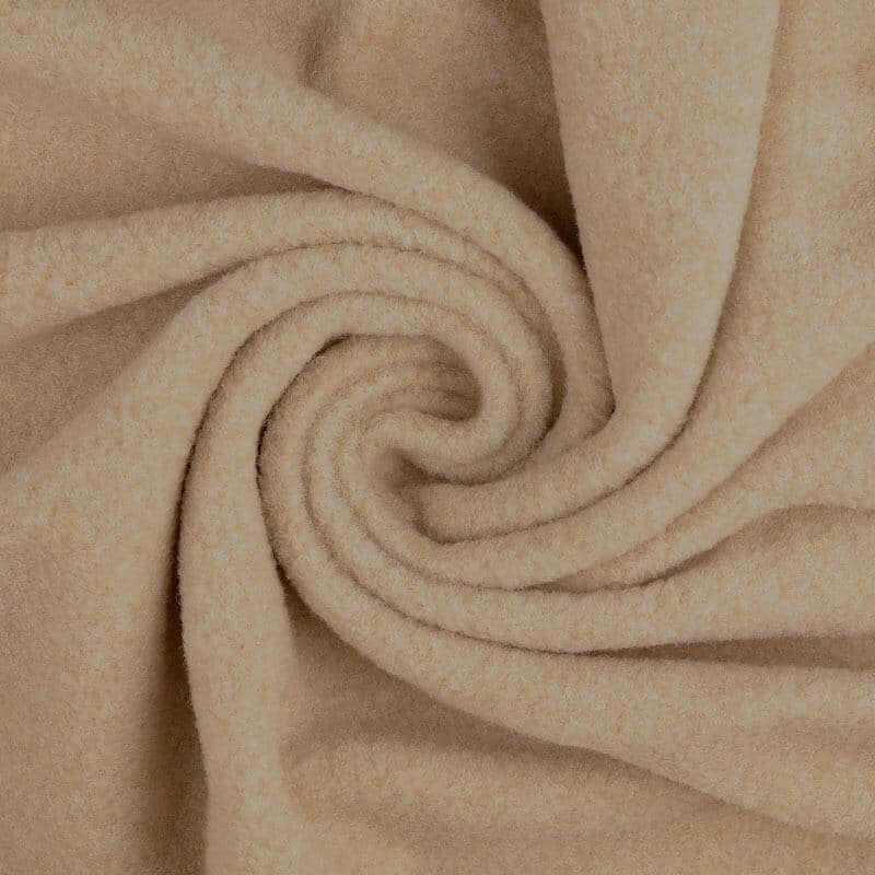Heavy, very soft felted flat boucle coating oatmeal in a swirl