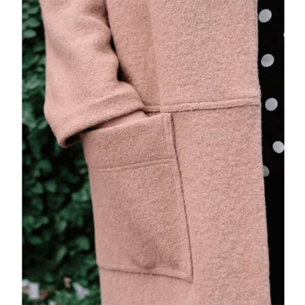 close up of peach style arc wool coat
