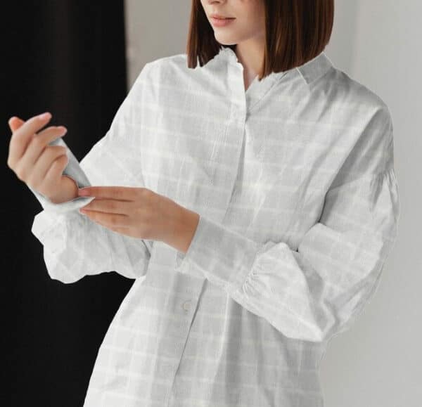 Lady wearing shirt of Cotton dobby voile squares fabric