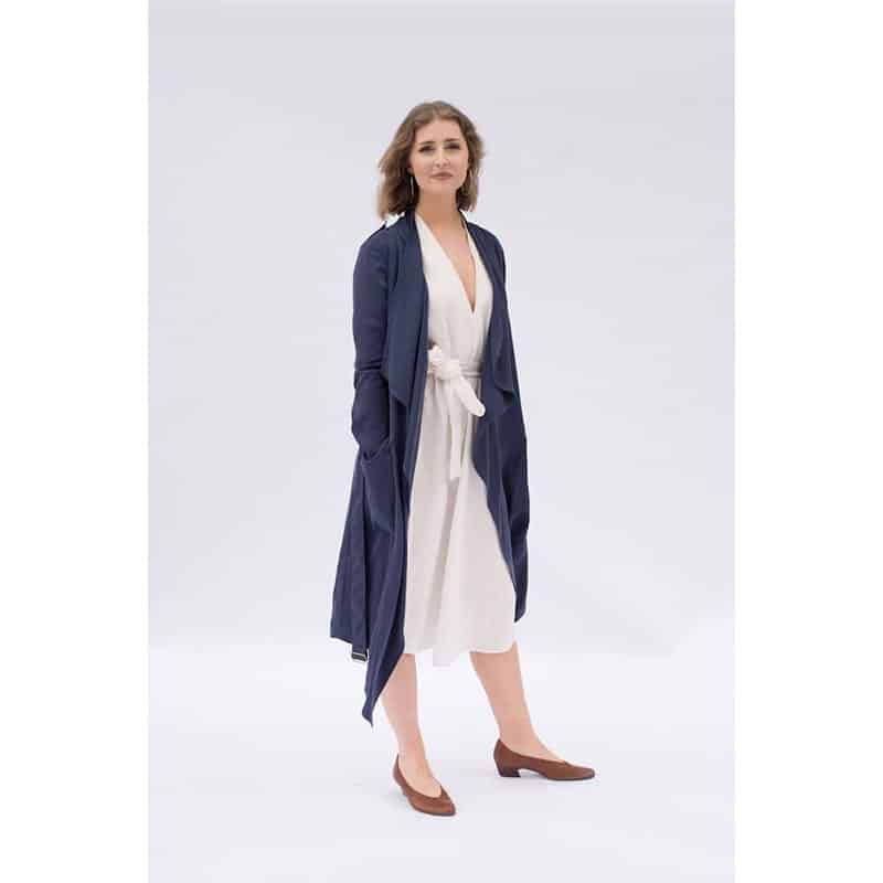 lady in white dress and blue coat