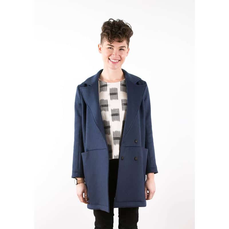 lady wearing navy tbp jacket with buttons