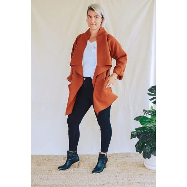 lady wearing sew to grow rust jacket