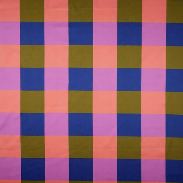Flat image of square blocks in pink and green patterned Nerida Hansen Fabric