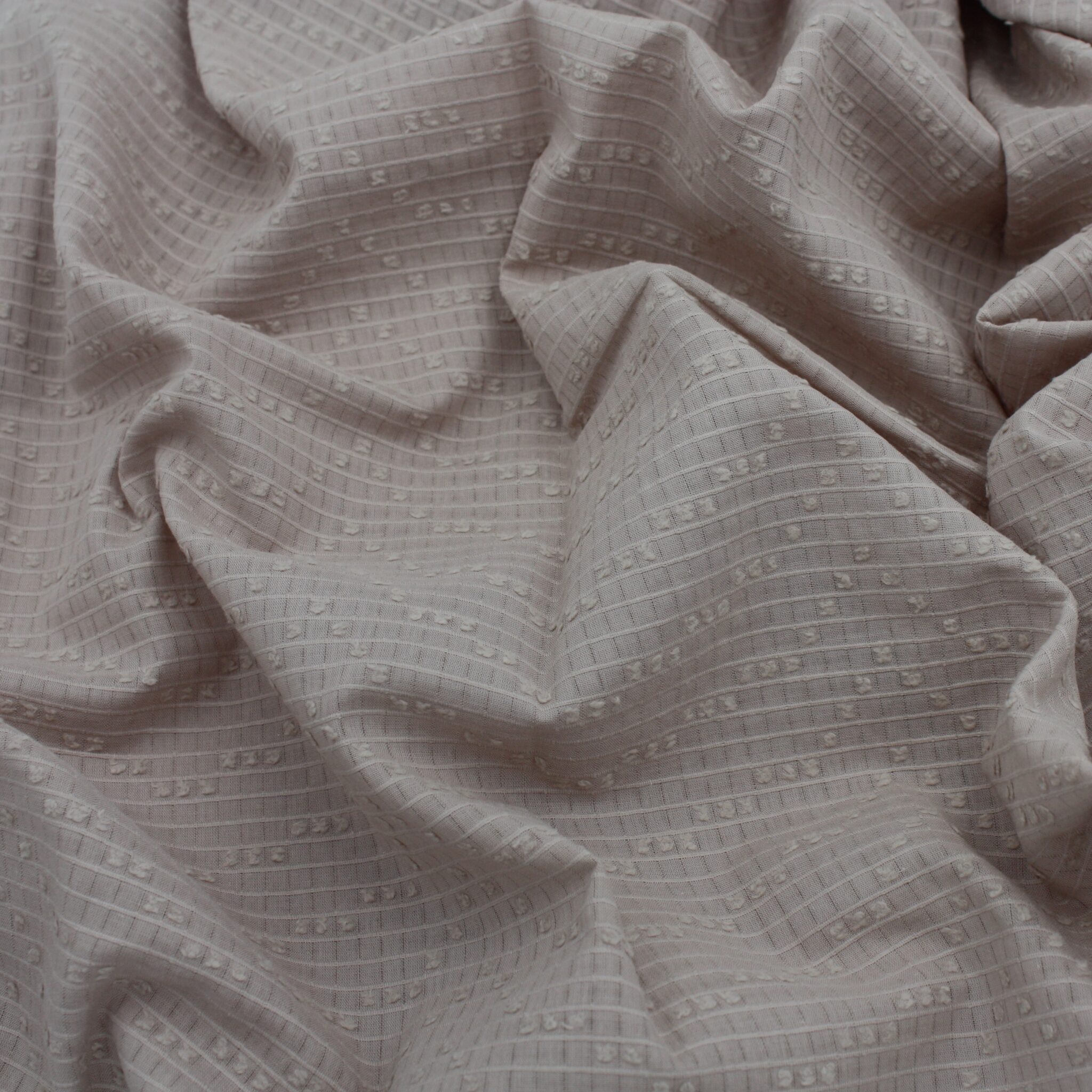 cotton dotted swiss domotex fabric in pebble