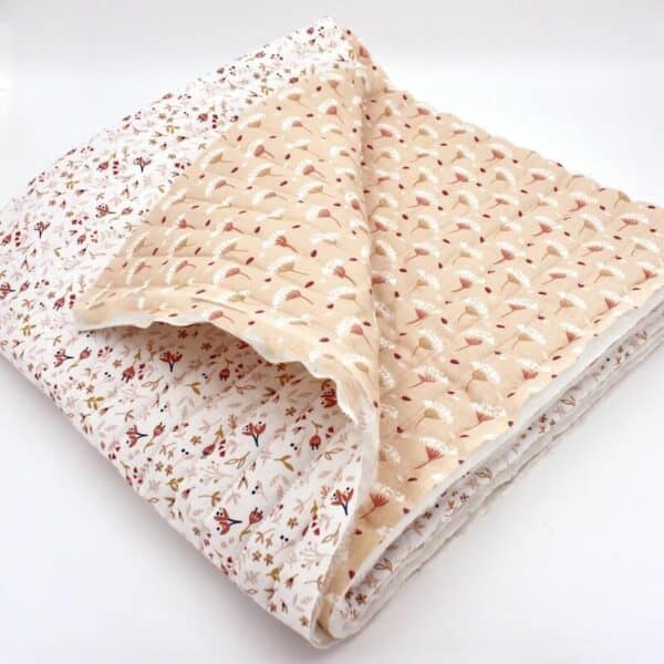 Double sided quilted cotton with fold in