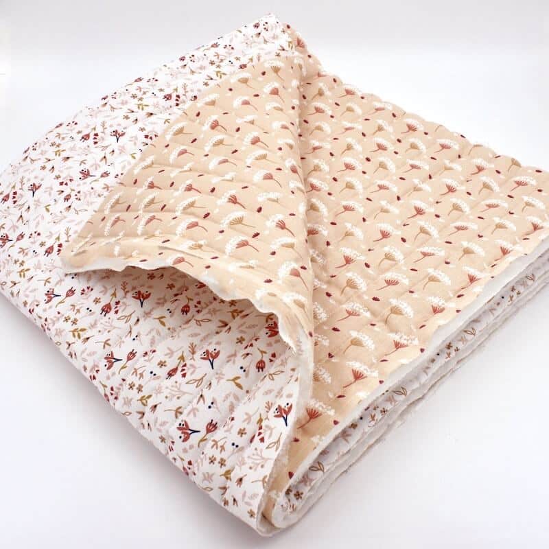 Double sided quilted cotton with fold in
