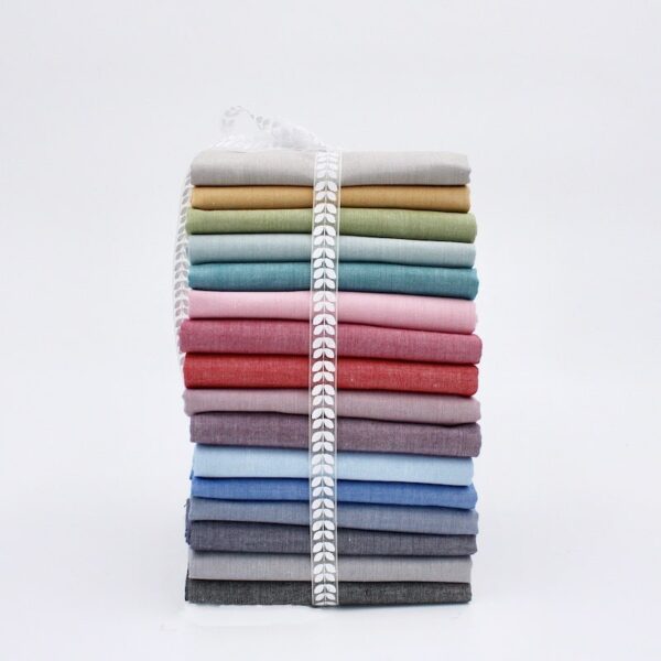16 x folded chambray cotton fabric bundle in lots of colours