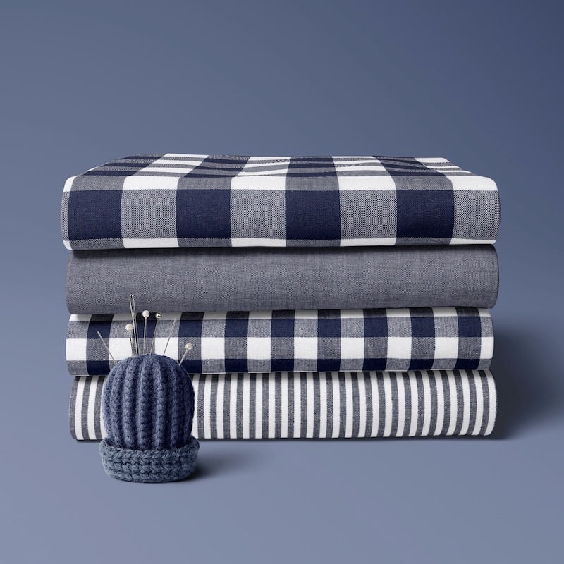 4 x folded cotton fabric bundle in navy