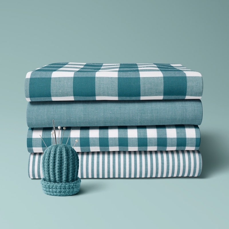 4 x folded cotton fabric bundle in teal