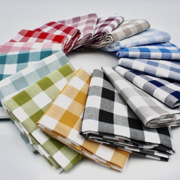 16 x folded 17mm gingham cotton fabric displayed in a circle in lots of colours
